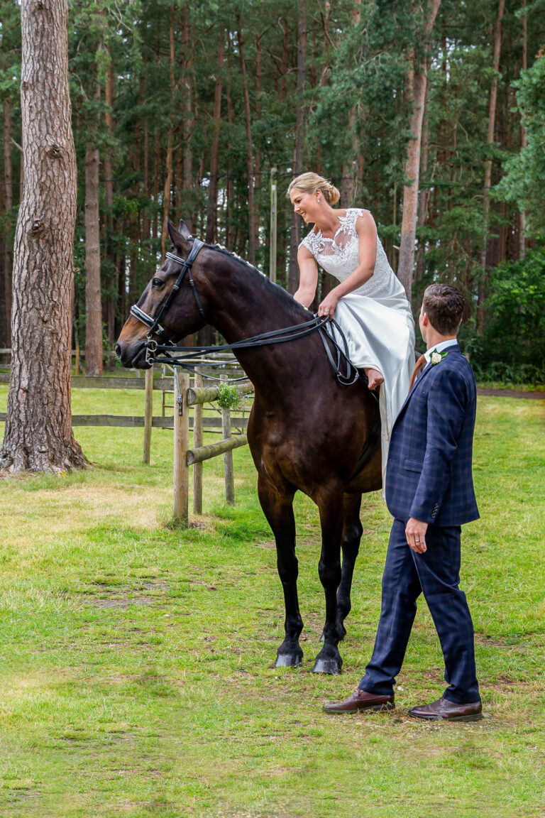 Country wedding bride sat on a horse