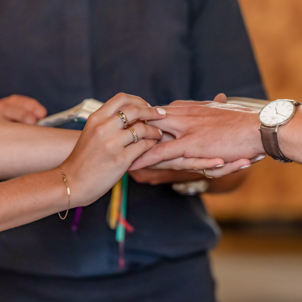 Exchanging rings at a wedding rehearsal