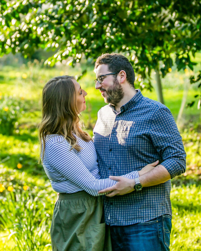 engaged couple arm in arm